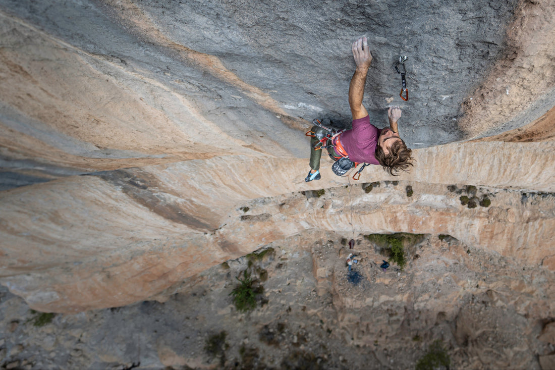 Chris Sharma Climbing the rock climbing route sleeping lion